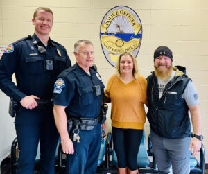 Jon and Hayley Klover with member of the police Department